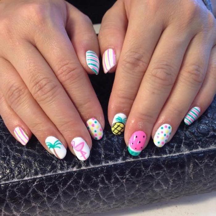 white nail polish, different colorful decorations, cute acrylic nail ideas, medium length squoval nails