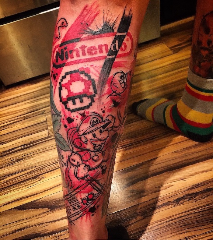 polka tattoo style nintendo games inspired leg tattoo super mario in black and red wooden floor