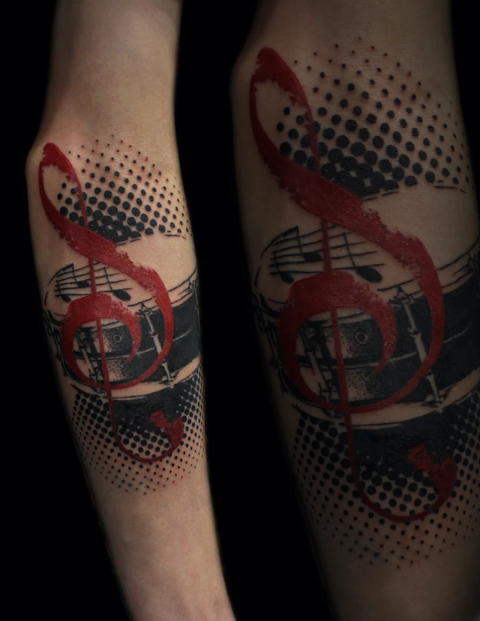 red musical key note white trash tattoo ideas drum surrounded by black dots forearm tattoo