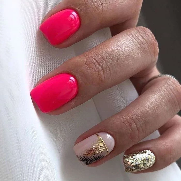 pink and nude nail polish, gold glitter nail polish, gold feathers decorations, summer coffin nails