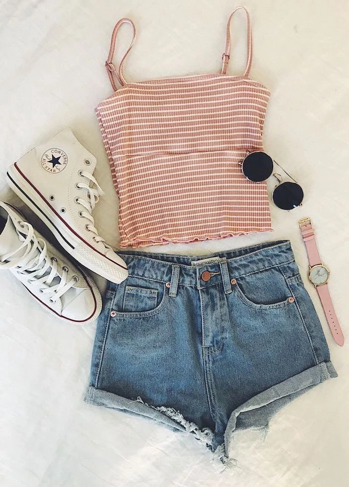summer outfits jean shorts pink crop top white high top converse sneakers pink wrist watch sunglasses