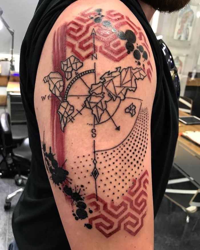 trash polka tattoo shoulder tattoo map of the world with compass arrows black and red tattoos