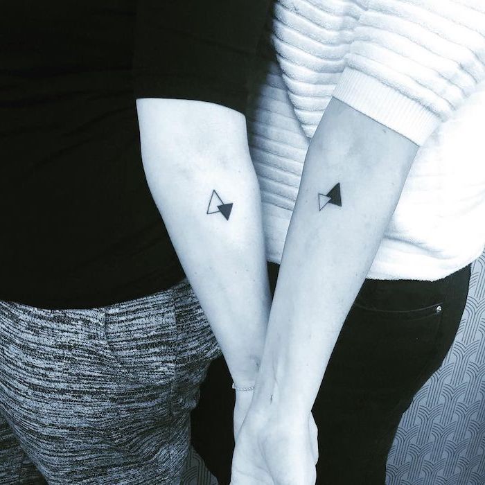 two connected triangles one white one black brother sister tattoos matching forearm tattoos