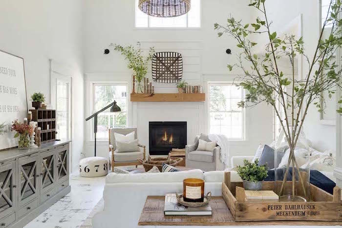 white furniture set, placed in front of a fireplace, farmhouse living room furniture, tall white walls