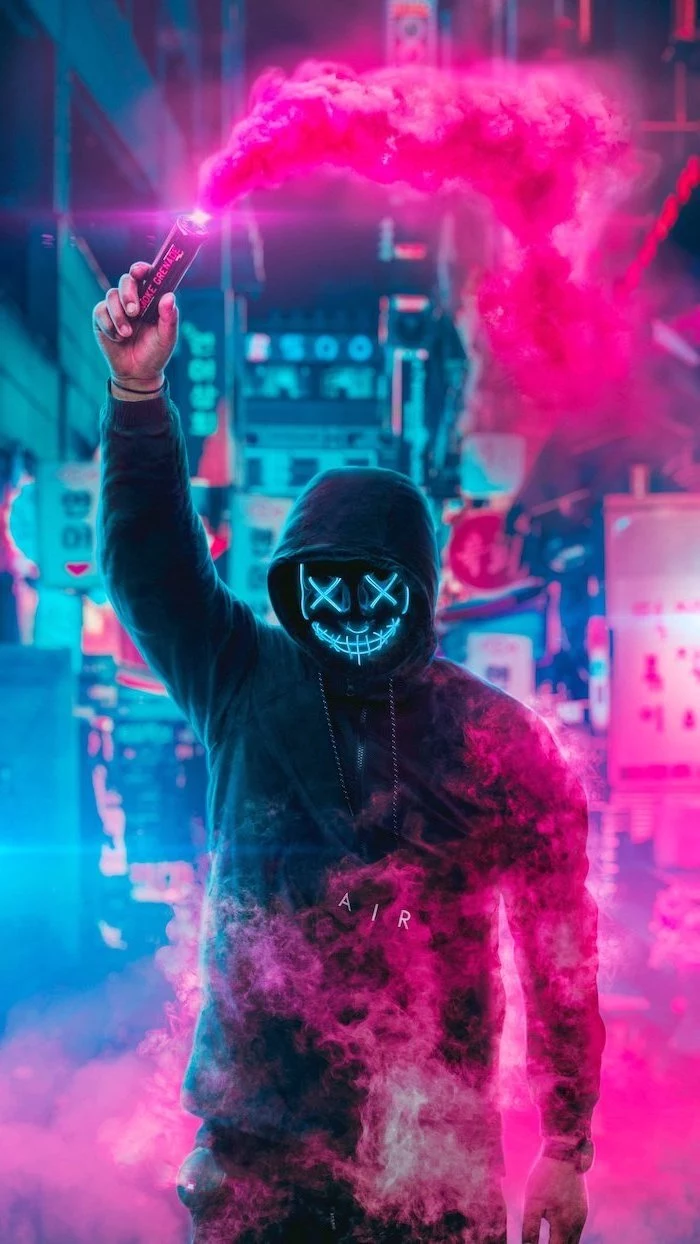 air jordan hoodie worn by man wearing purge mask with neon lights super cool wallpapers holding pink smoke bomb