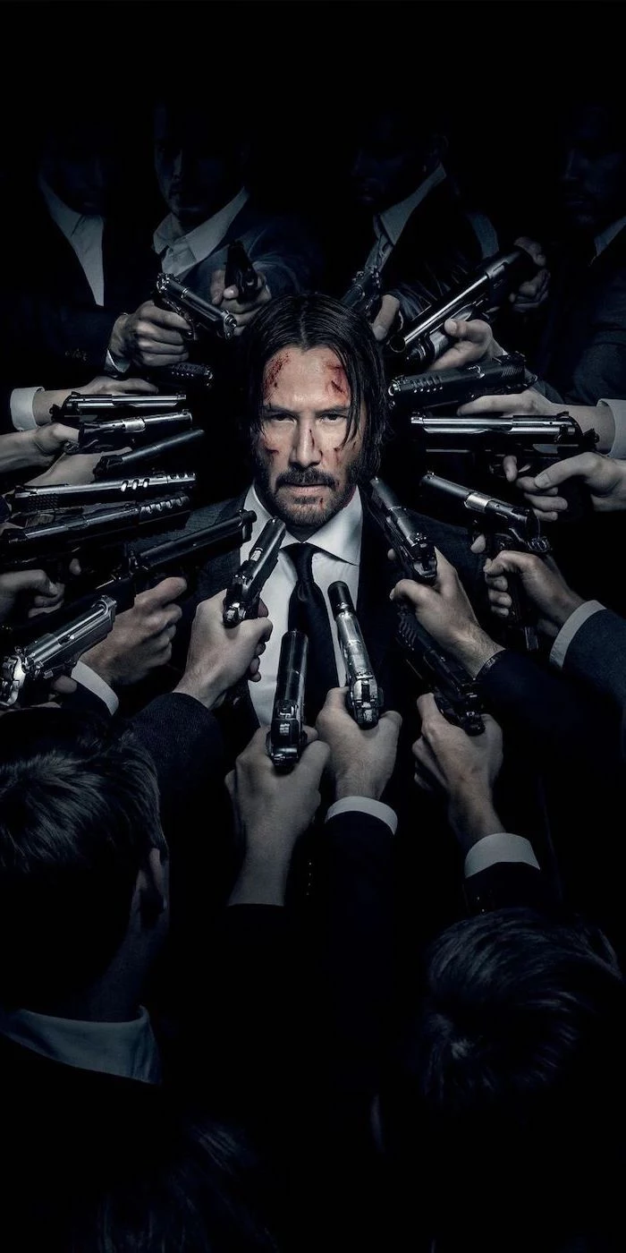 backgrounds for boys keanu reeves as john wick surrounded by men holding guns pointed at him