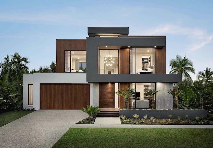 black and wooden facade of two storey house front yard landscaping ideas palm trees planted in front of it with grass
