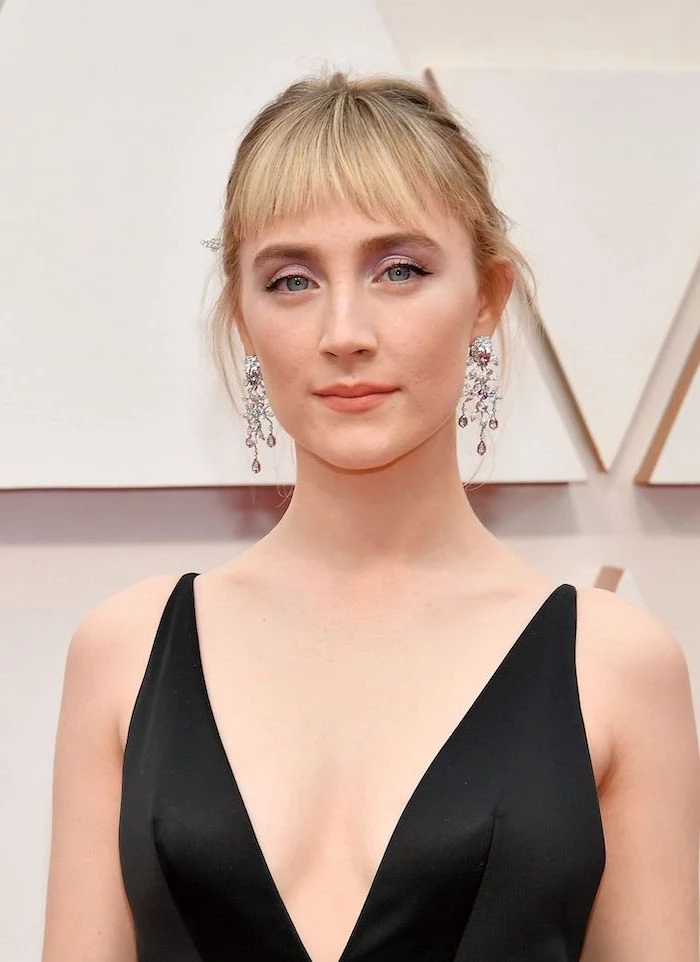black dress worn by saoirse ronan on the red carpet haircut for thin hair to look thicker short bangs blonde hair in high updo