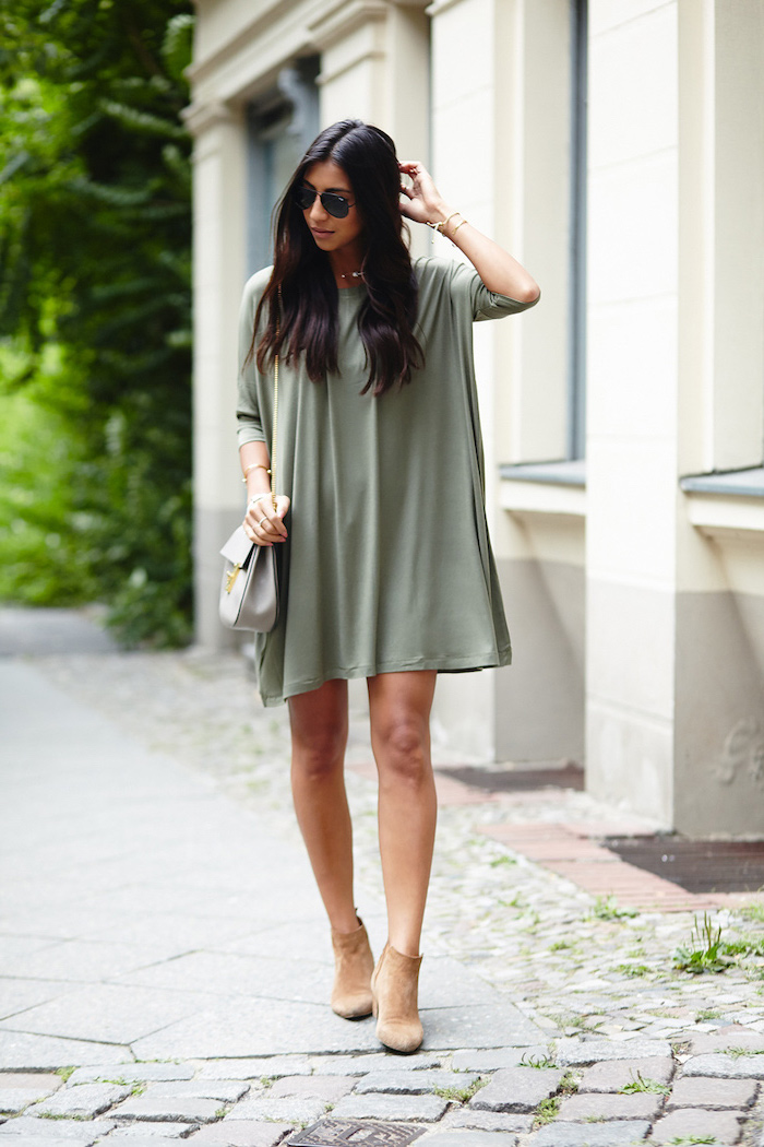 black long wavy hair on girl wearing olive green dress casual summer maxi dresses brown velvet boots white bag