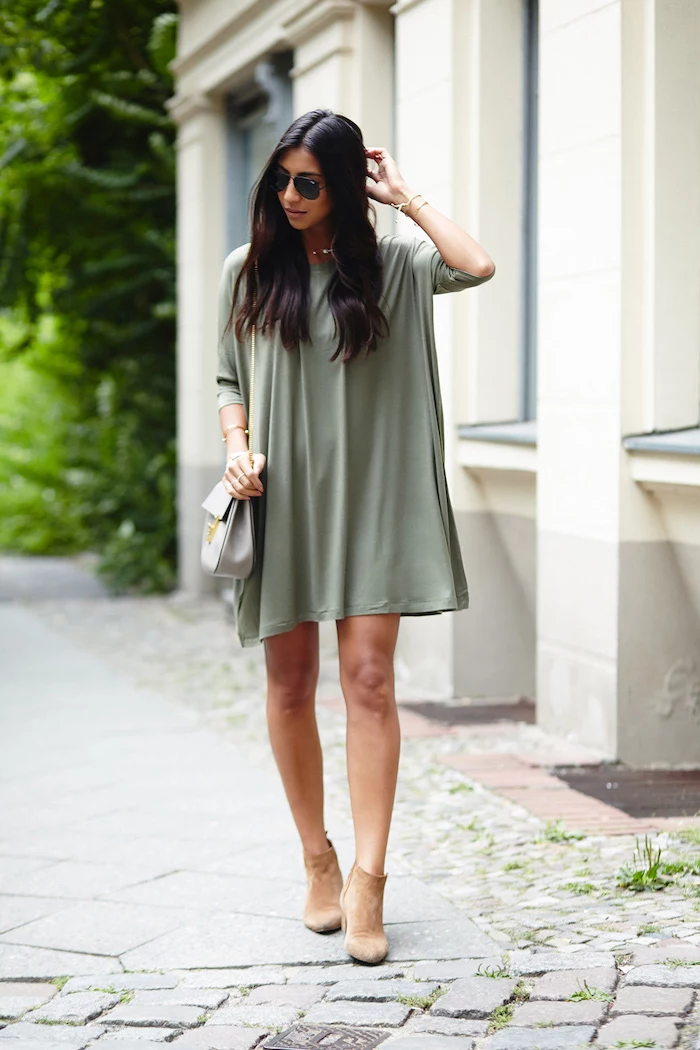 black long wavy hair on girl wearing olive green dress casual summer maxi dresses brown velvet boots white bag