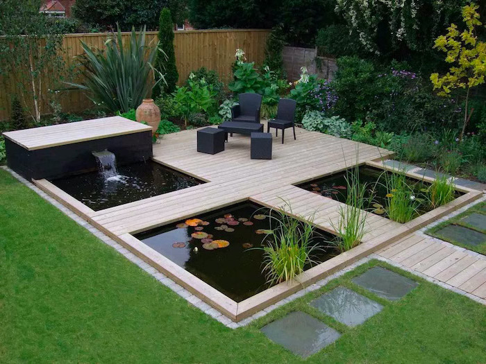black metal garden furniture backyard paver ideas small backyard lake with fountain wooden bridges