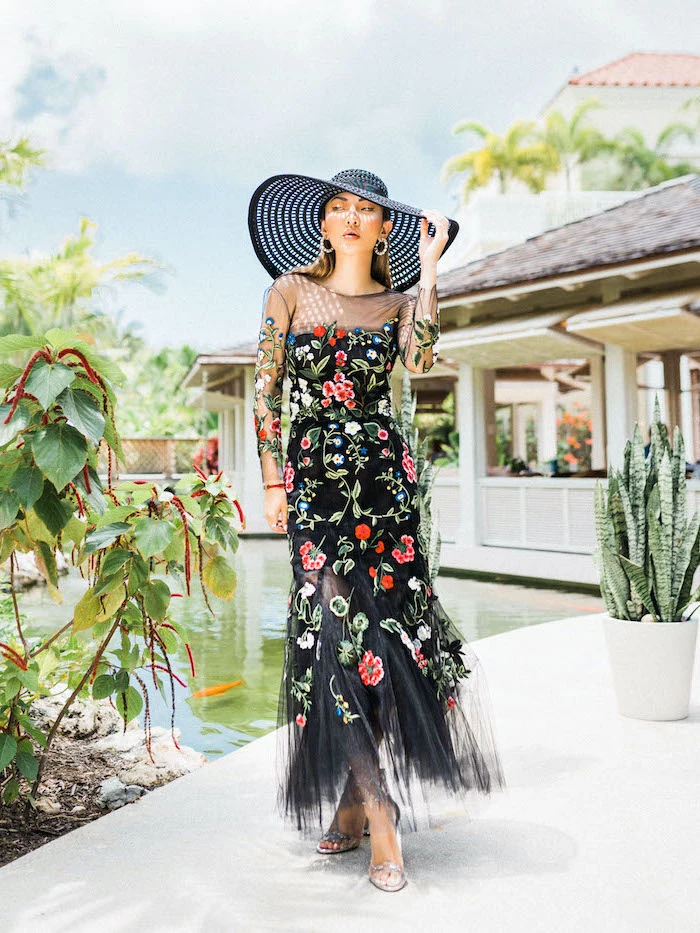 black tulle dress with flowers dresses to wear to a summer wedding black hat worn by blonde woman