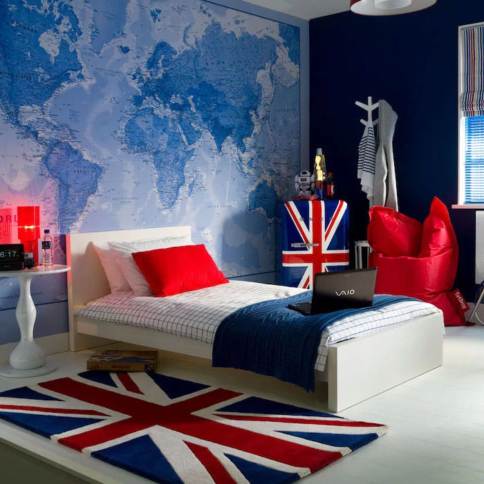 blue walls map of the world behind the bed bedroom ideas for teenage guys with small rooms united kingdom carpet theme red puff chair