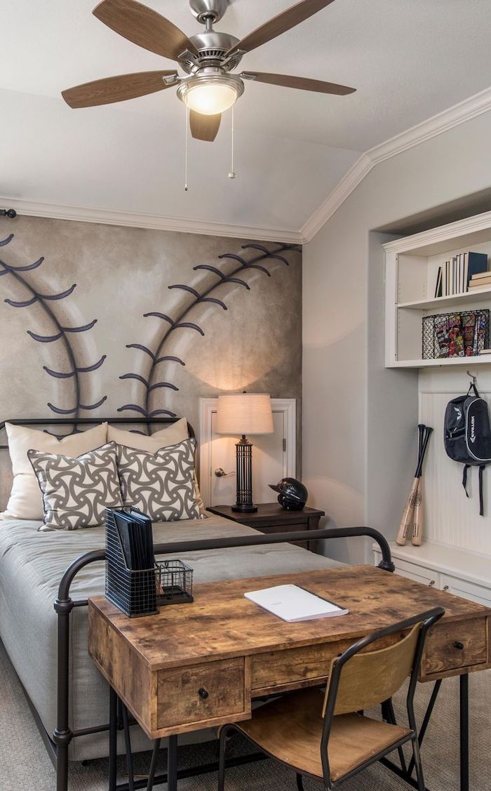 boys bedroom decor baseball themed room with poster on the wall behind the bed wooden desk and chair metal bed frame