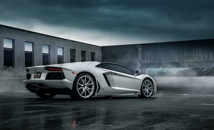 dark aesthetic cool phone wallpapers white lamborghini parked in front of warehouse cloudy sky