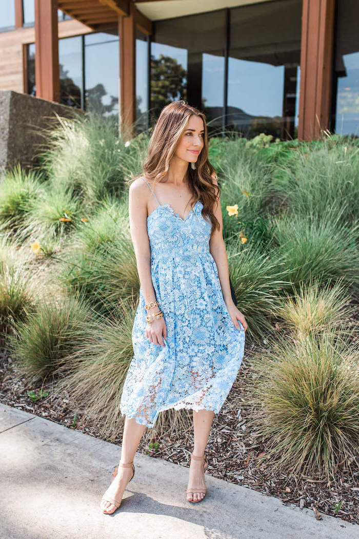 girl with long brown wavy hair wearing blue lace dress long sleeve wedding guest dresses nude sandals