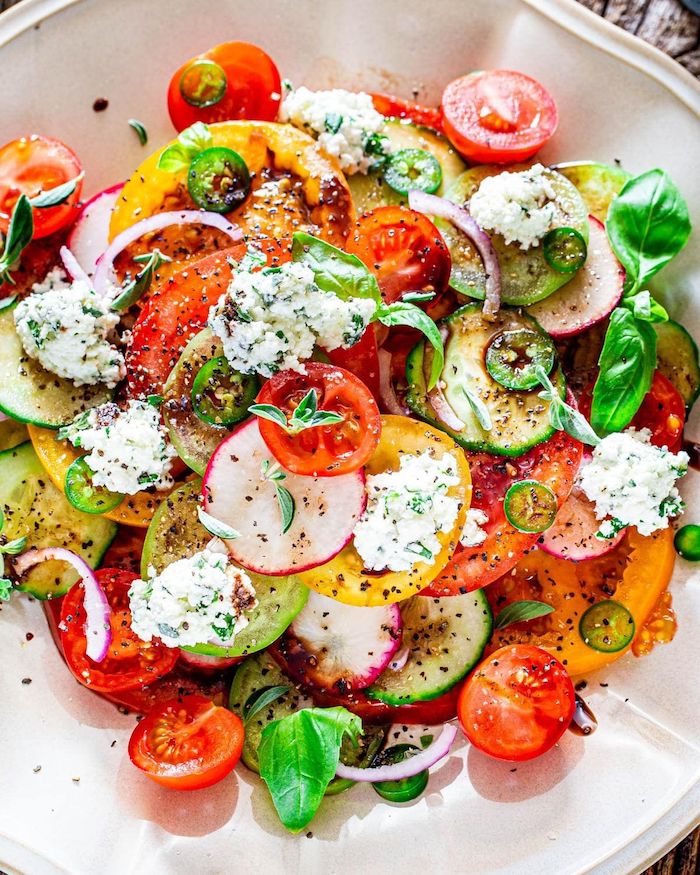 ricotta salad with tomatoes cucumbers turnip peppers different types of salads basil leaves for garnish