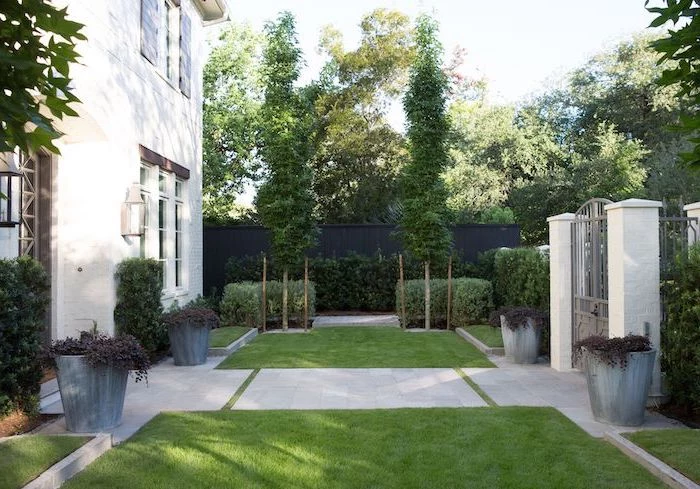white tiled pathway surrounded by grass leading from gate to front door landscaping ideas for front of house surrounded by bushes