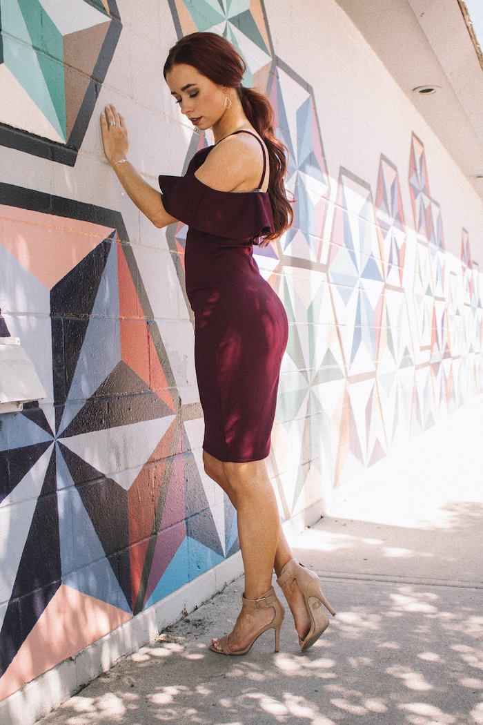 woman wearing purple burgundy dress beige sandals sexy summer dresses brunette long hair in low ponytail