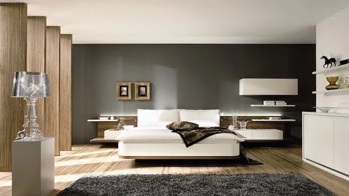 wooden floor black accent wall black carpet master bedroom decor white bookshelves wooden columns