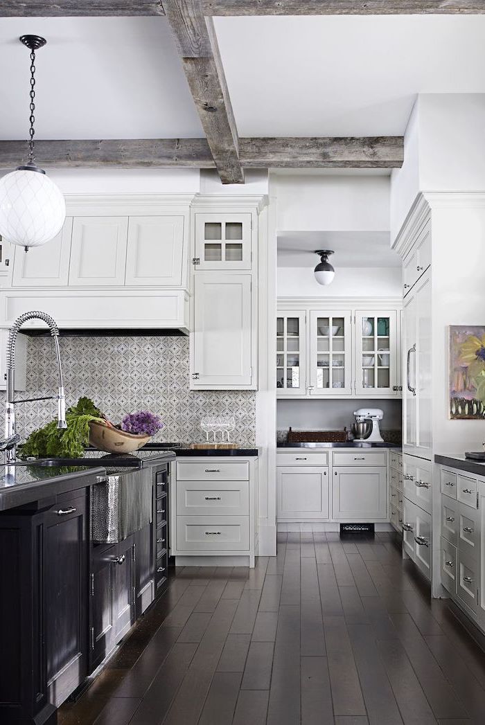 backsplash for white cabinets dark wooden floor white cabinets with black countertop black kitchen island patterned tiles backsplash