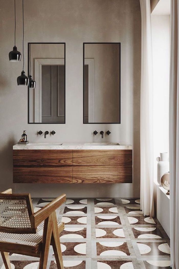 bathroom picture ideas floating wooden cabinets with two sinks two mirrors above them tiles with pattern in brown gray and white on the floor