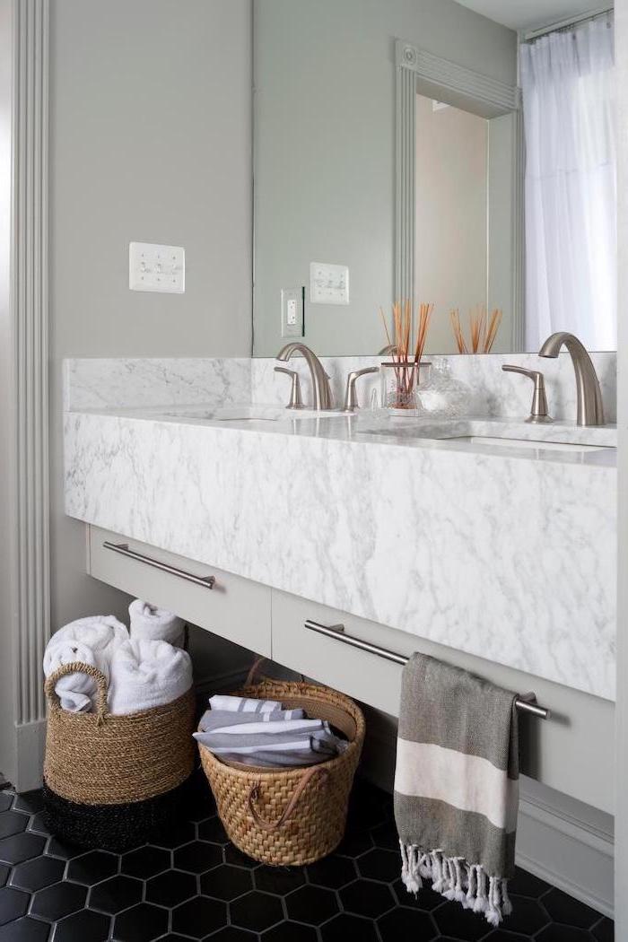 black honeycomb tiles on the floor how to decorate a small bathroom white floating cabinet with marble countertop with two sinks