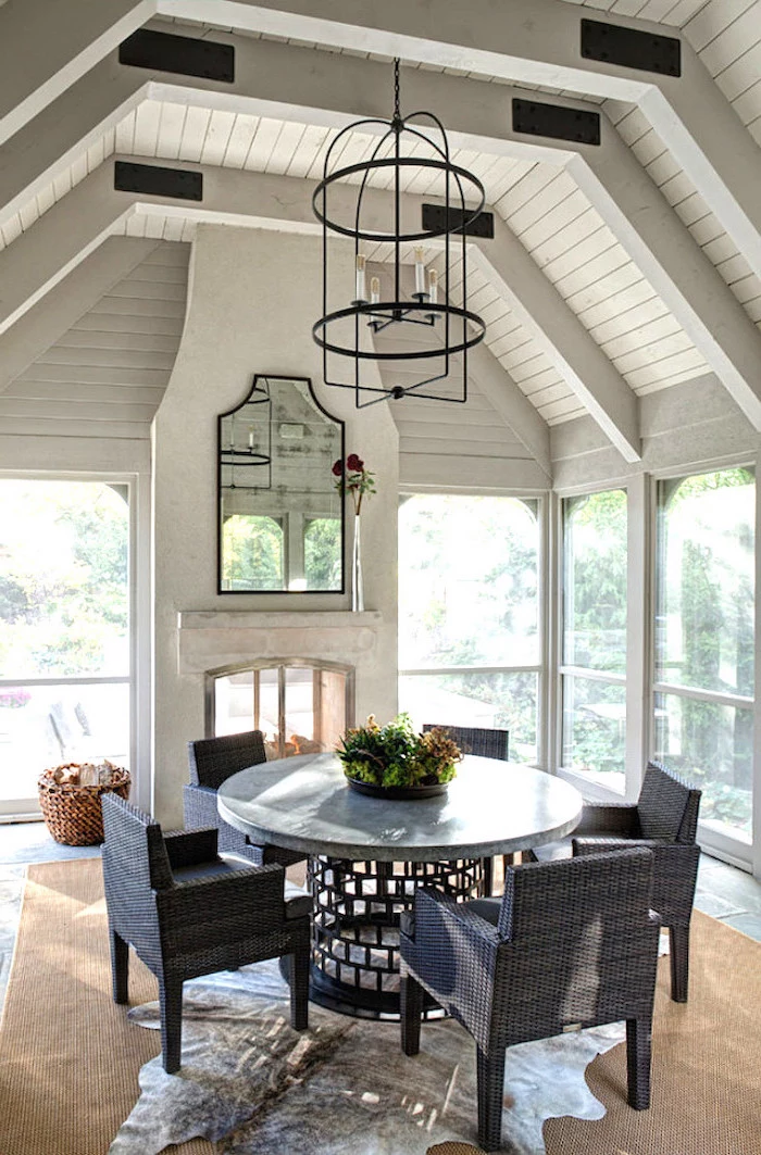 black metal chandelier how to build a screened in porch garden furniture set with black metal table with granite countertop