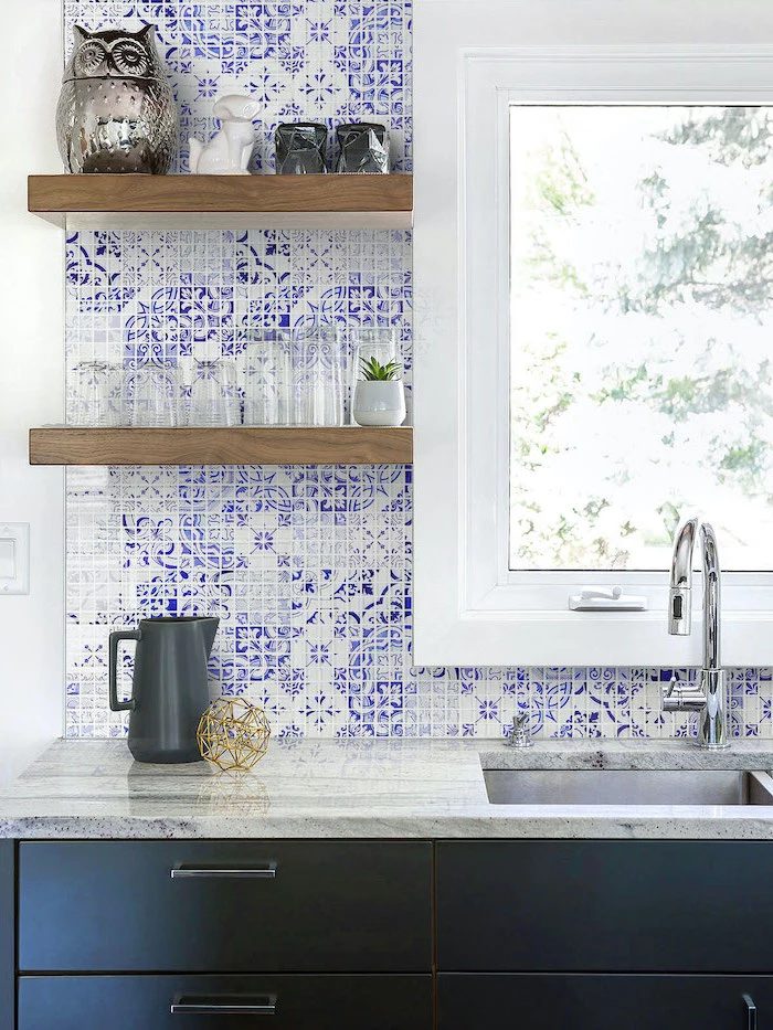 blue and white patterned tiles backsplash tile ideas black cabinets with granite countertops wooden open shelving