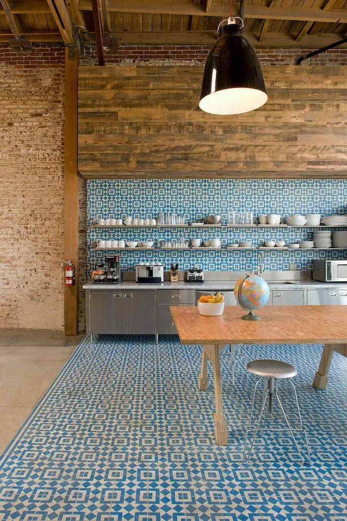 blue and white patterned tiles matching on the floor and wall open shelving with long shelves how to tile a backsplash stainless steel cabinets