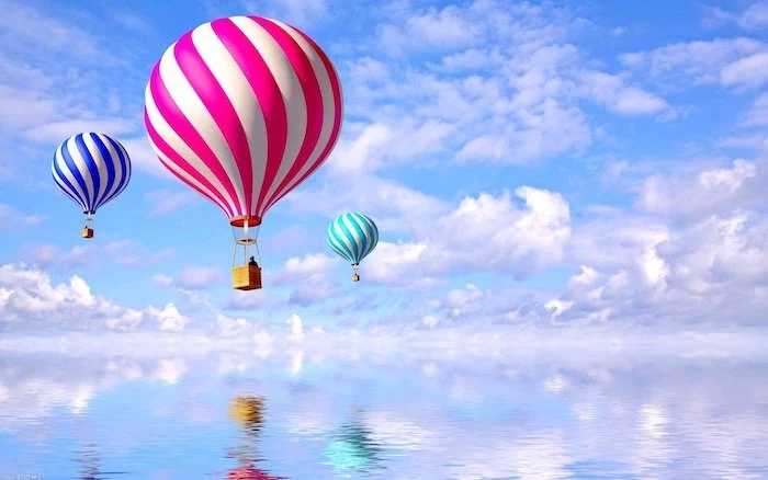 blue sky with lots of white clouds free wallpaper for computer colorful hot air balloons in the sky above blue water