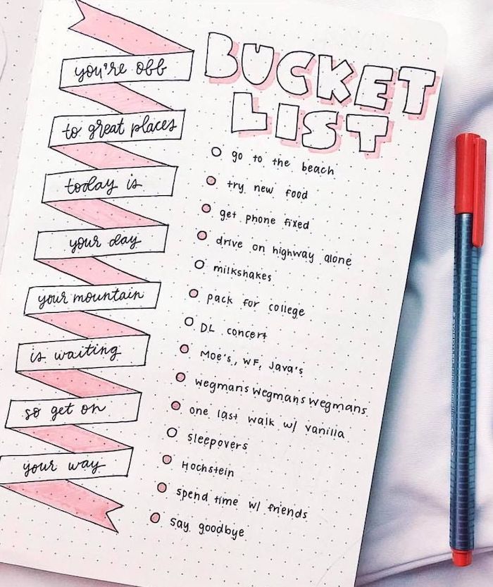 bucket list with different things to do written in pink and black on white notebook bullet journal page ideas pen on the side