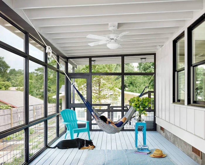 covered porch ideas white wooden ceiling wall hammock hanging from the ceiling turquoise armchair