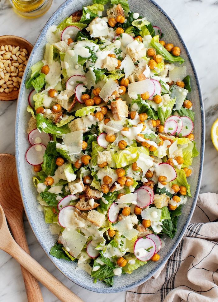 easy chickpea recipes ceaser salad with croutons iceberg lettuce turnip chockpeas parmesan cheese in large plate