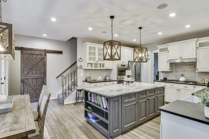 farmhouse kitchen decor ideas gray wooden kitchen island with granite countertop white cabinets black countertop