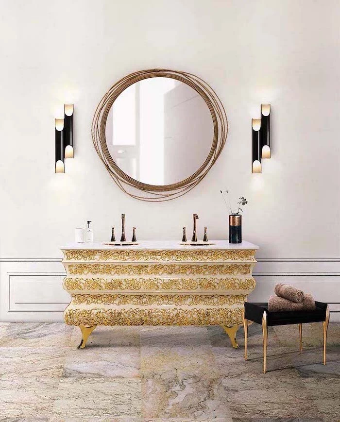 golden accents on vintage cabinet with two sinks round mirror above it bathroom picture ideas vintage ottoman on the side