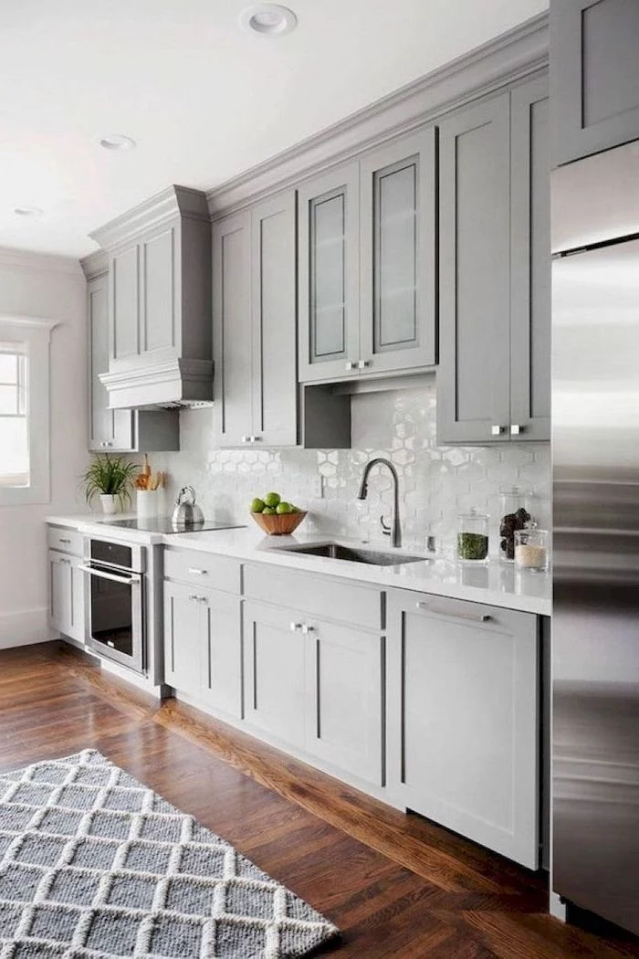 gray cabinets dark wooden floor white tiles backsplash farmhouse kitchen cabinets gray and white carpet