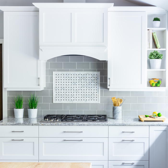 gray tiles above the stove backsplash for white cabinets white cabinets with granite countertop