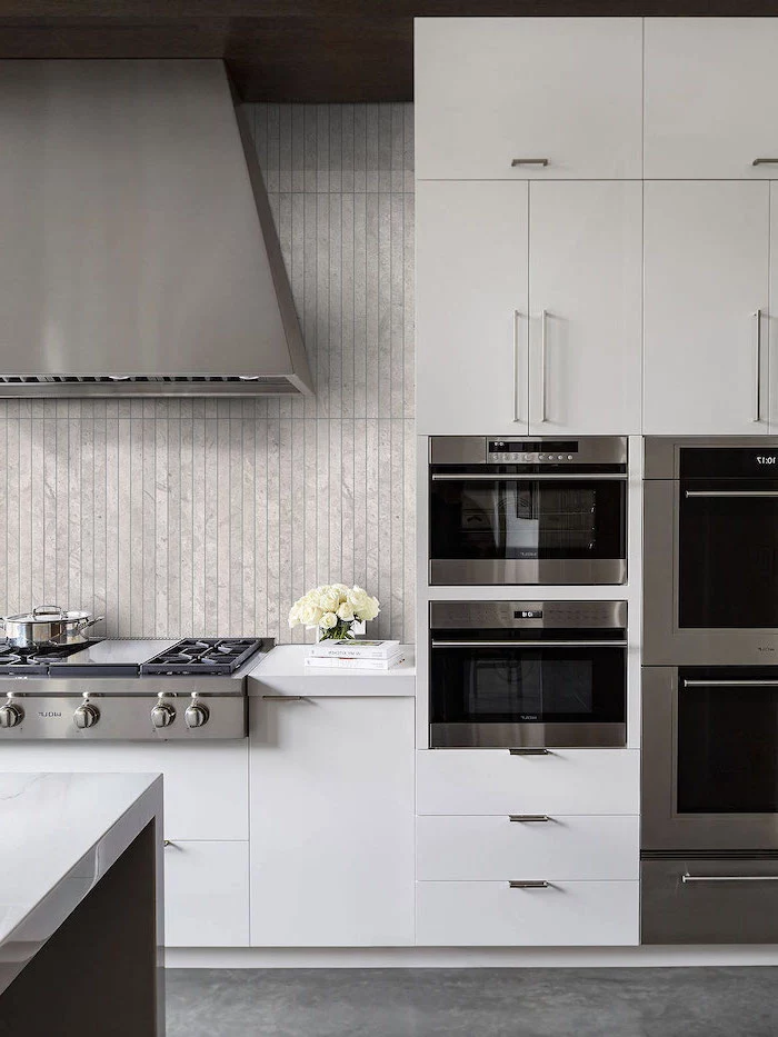 gray tiles backsplash modern kitchen backsplash white cabinets granite floor stainless steel appliances