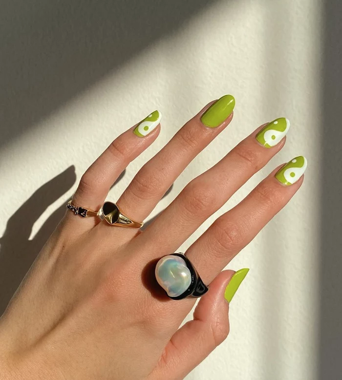 green and white nail polish nail designs for short nails almond nails with yin yang decorations
