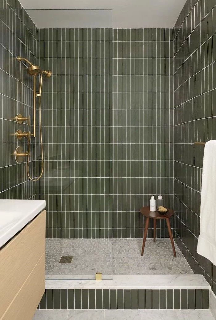 green tiles on the walls small bathroom remodel ideas honeycomb tiles on the floor in shower cabin with brass shower head