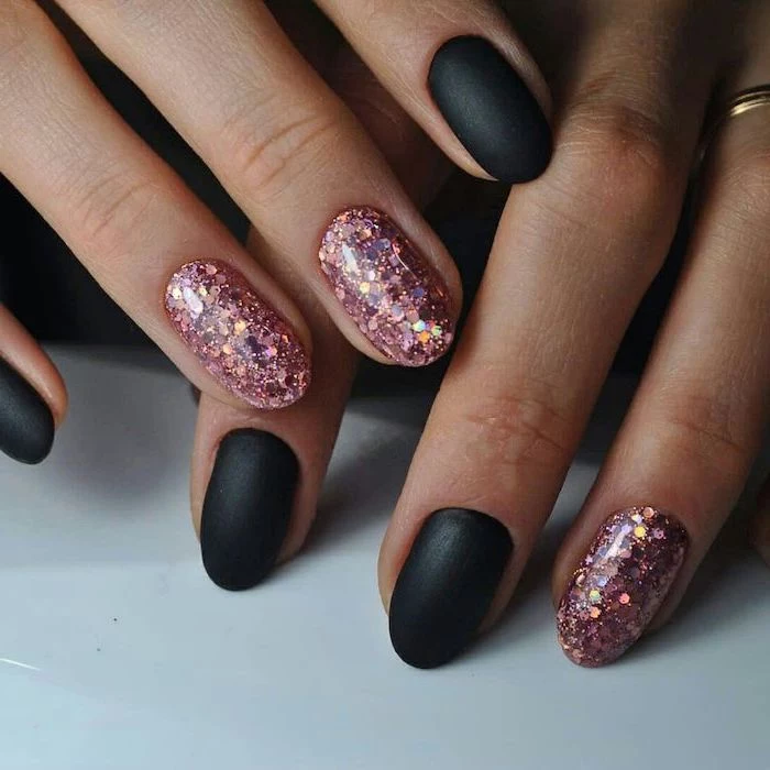 nail designs 2020 black matte nails polish with pink glitter on two fingers on each hand short almond shaped nails