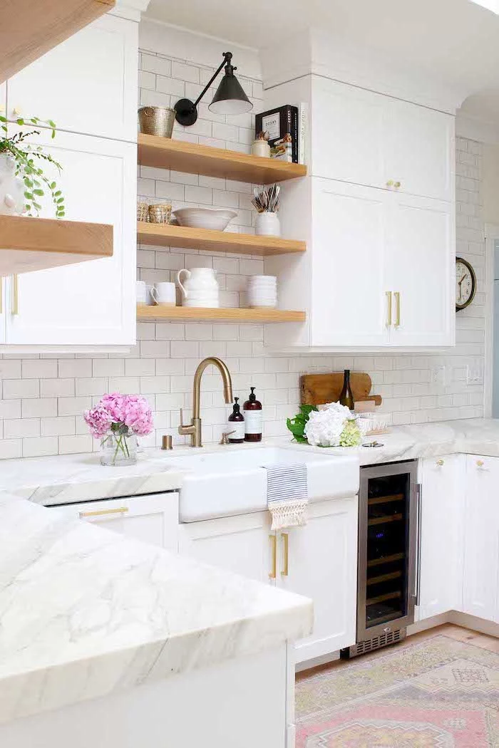open shelving on white subway tiles white cabinets with marble countertop farmhouse kitchen backsplash colorful carpet