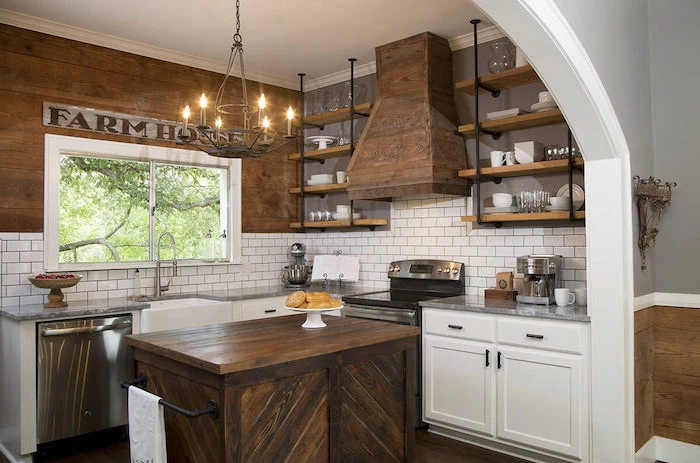 open shelving wooden kitchen island vintage chandelier white cabinets modern farmhouse kitchen white tiles backsplash