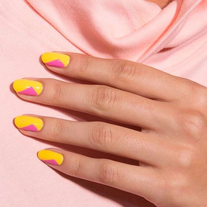 pink and yellow nail polish on short almond nails multi colored nails geometrical nail design