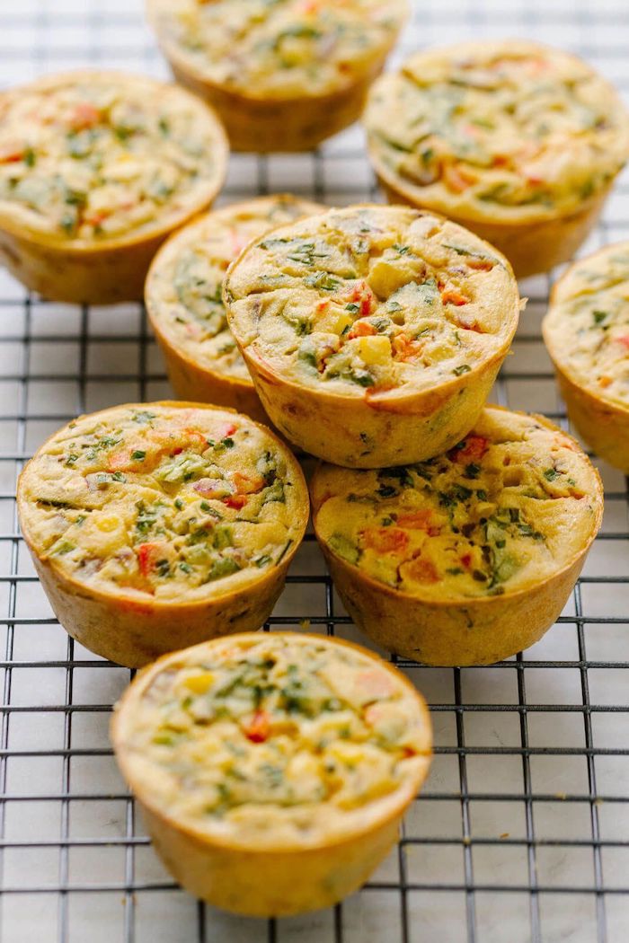 roasted chickpeas snack frittata made with chickpeas herbs and tomatoes muffins arranged on metal rack