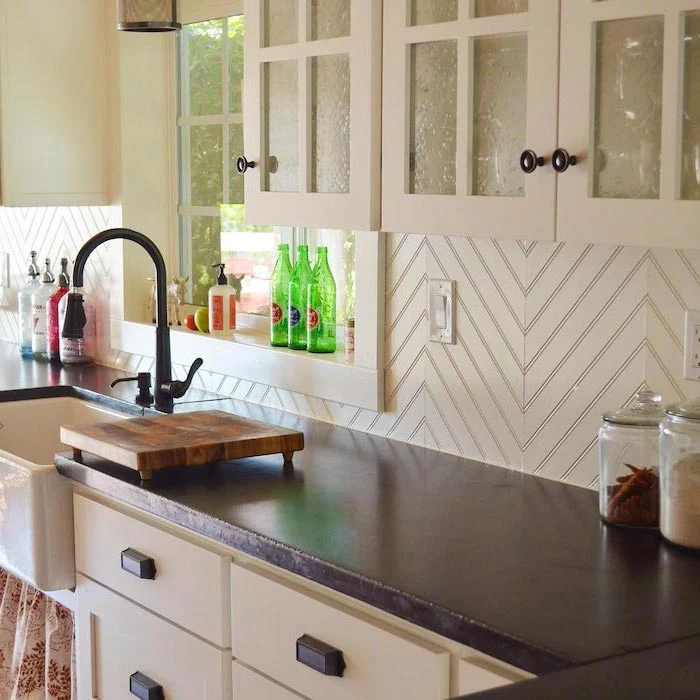 shiplap in white for backsplash white cabinets with glass doors with black granite countertop kitchen backsplash ideas