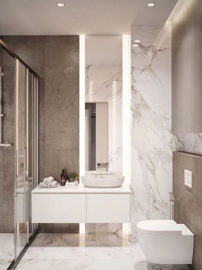 white floating cabinet with large mirror above it with led lights bathroom picture ideas marble tiles on floor wall granite tiles in the shower cabin
