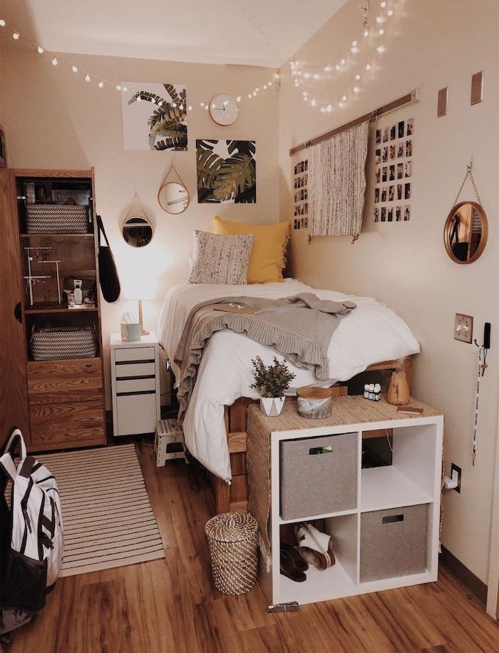 50 Cozy And Cute Teenage Girl Bedroom Ideas For Small Rooms - BeD MaDe Of Palettes White Walls With Art AnD PolaroiDs On It Teenage Girl BeDroom IDeas For Small Rooms Fairy Lights Hanging From The Ceiling