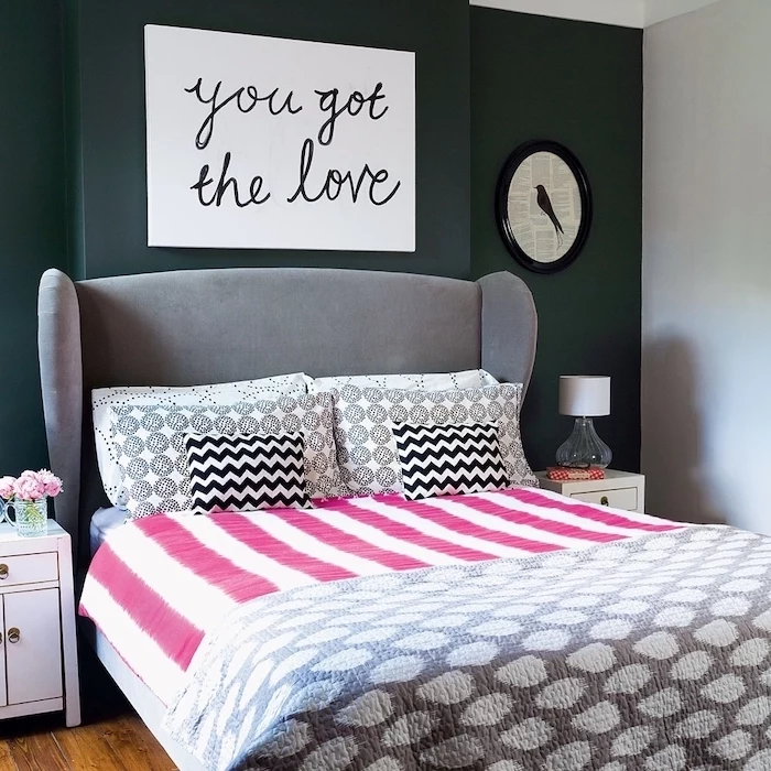 black accent wall behind the bed with gray velvet headboard room decor ideas for girls bed linen and throw pillows in white black pink gray